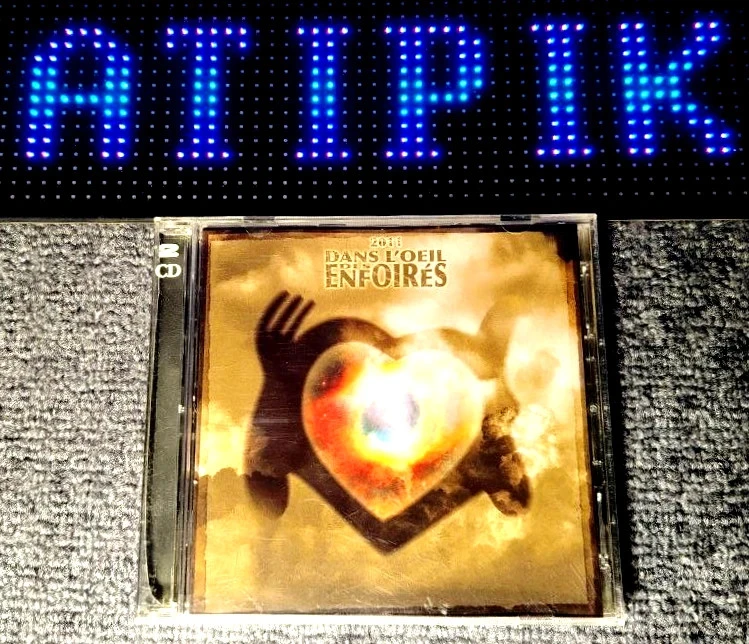 💿 Dans L'Œil Des Enfoirés 2011 - Double CD Restos Du Cœur - 15 Ans 👌